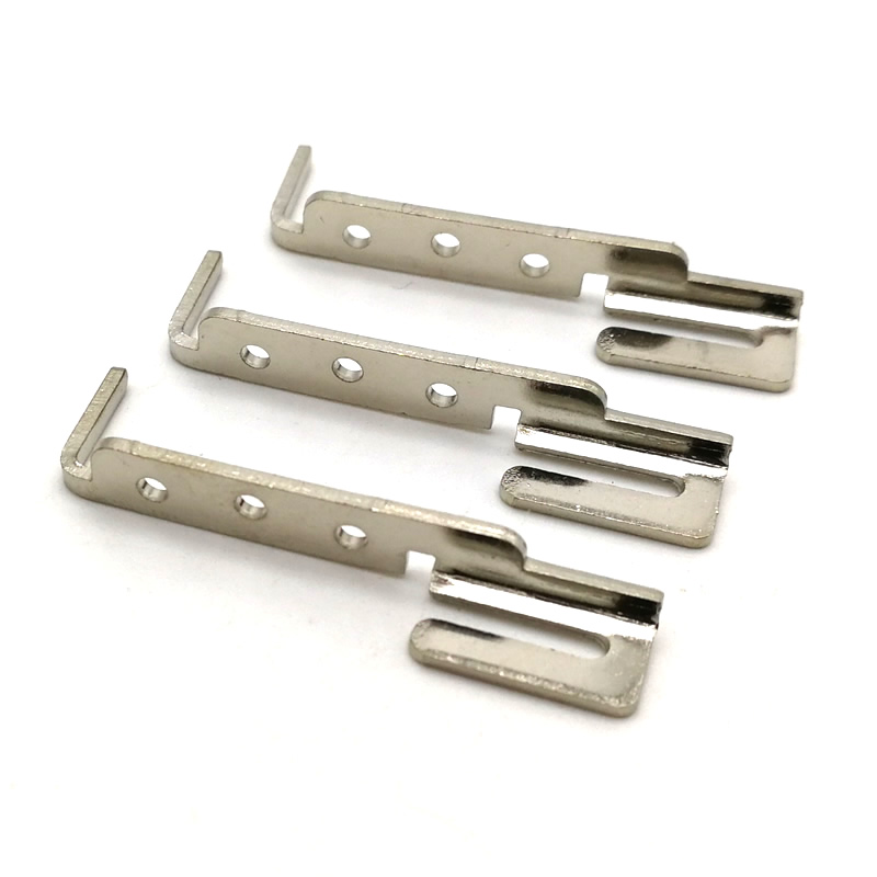 Pièces d'emboutissage progressif